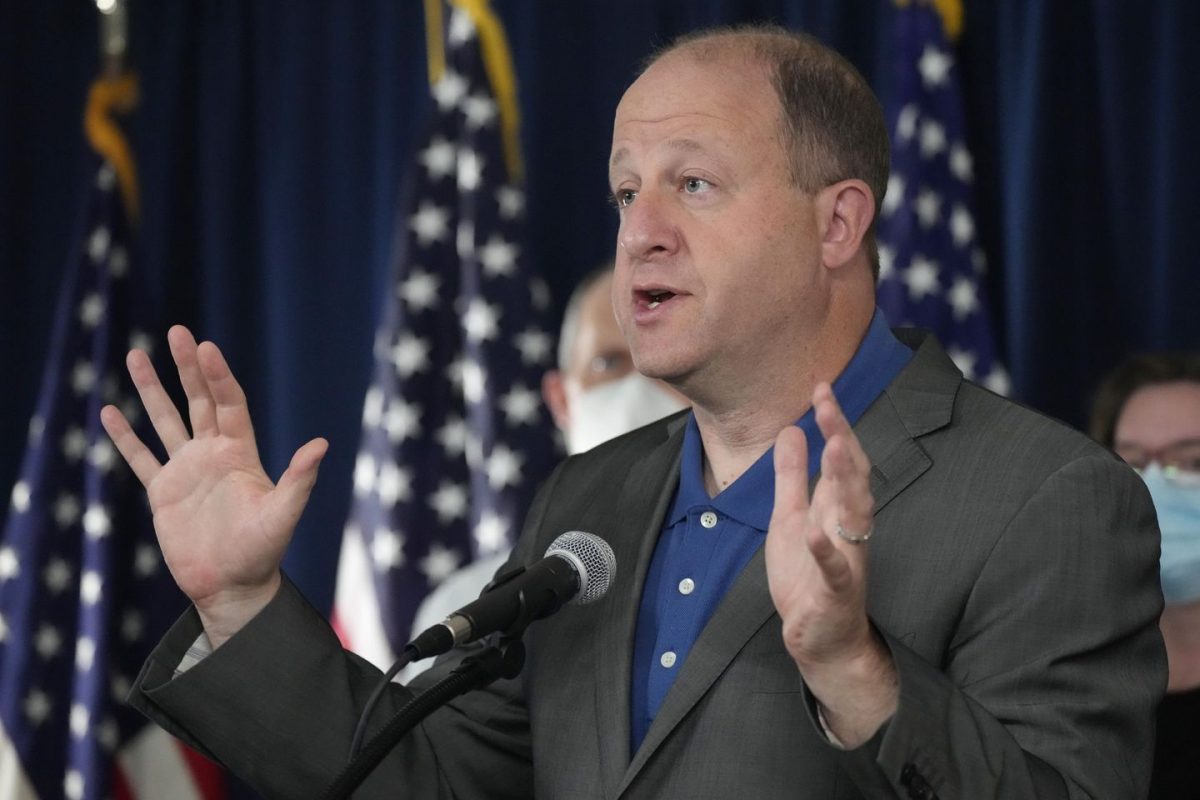 Jared Polis, Colorado governor, defies feds, says all adults can get COVID boosters