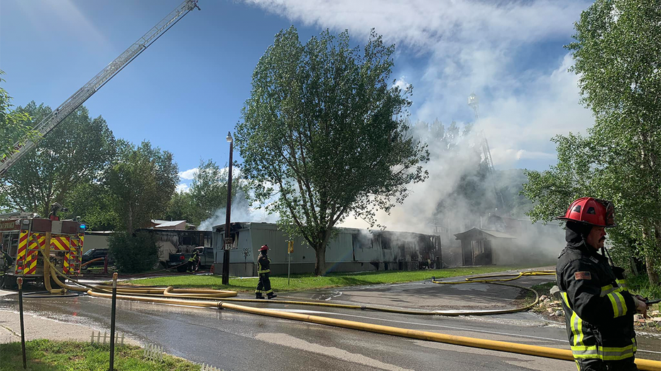 Plane crashes into Colorado mobile home park, setting two trailers ablaze